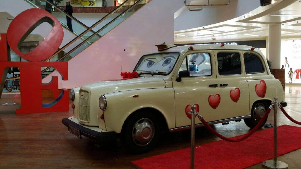 Our White Taxi Photo Booth Decorated For Valentines Day