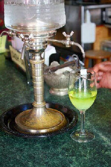 Absinthe Dripping Into A Glass