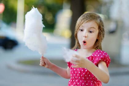 Little Girl Eating Candy Floss